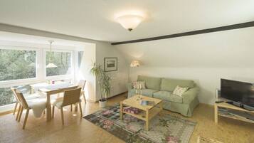 Una Smart TV, un reproductor estéreo