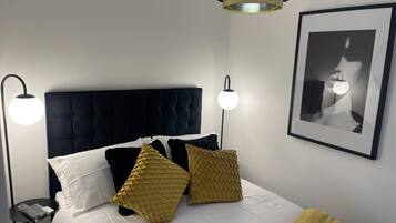 1 habitación, tabla de planchar con plancha, wifi gratis y ropa de cama