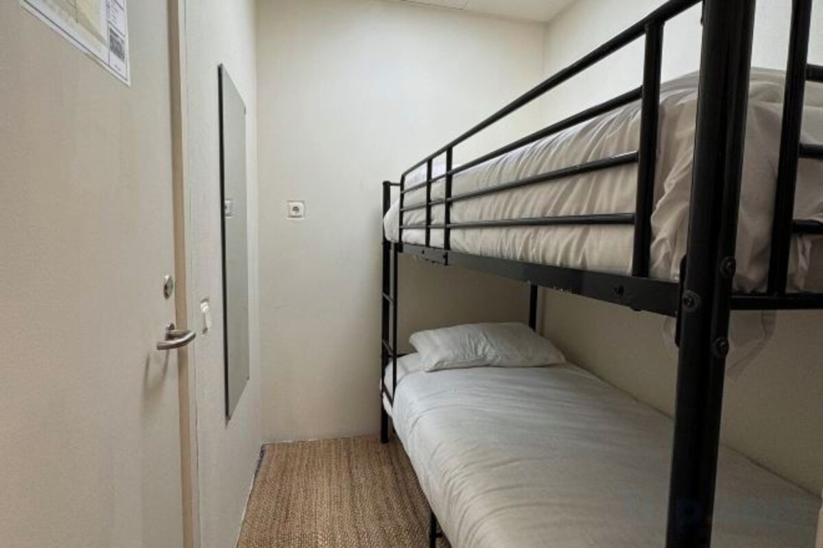 Twin Room With Bunk Beds And Toilet