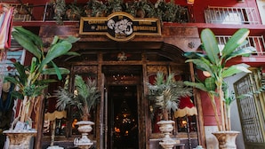 A building facade with a sign reading "Compania de Juan Rodriguez Est. 1903 Panama". - Juan Rodriguez Hacienda (Athens)