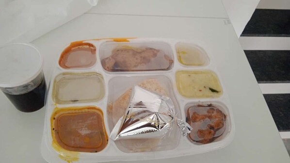 A meal tray with various food items and a drink. - J Park Auroville Beach (Vanur)