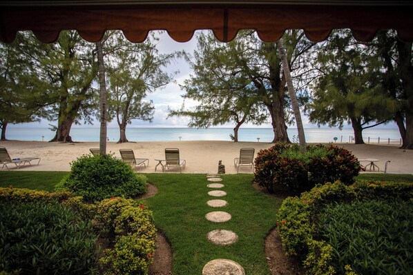 On the beach - Beachfront Bliss: Ground Floor Condo at The Islands Club, 7 Mile Beach, #05 (Grand Cayman)