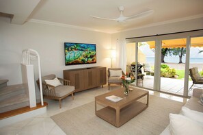 Smart TV, table tennis, books, offices - Beachfront Bliss: Ground Floor Condo at The Islands Club, 7 Mile Beach, #05 (Grand Cayman)