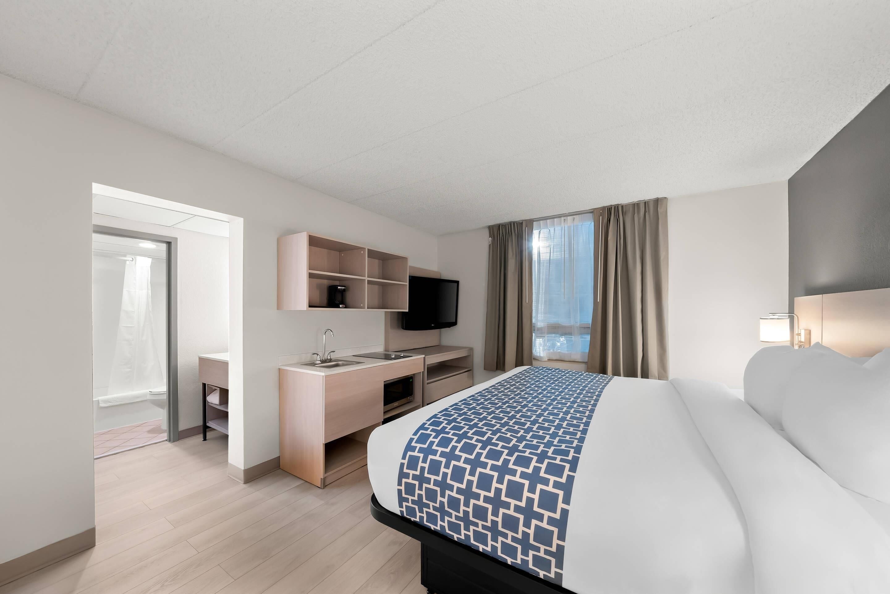 Laptop workspace, blackout curtains, free WiFi, bed sheets