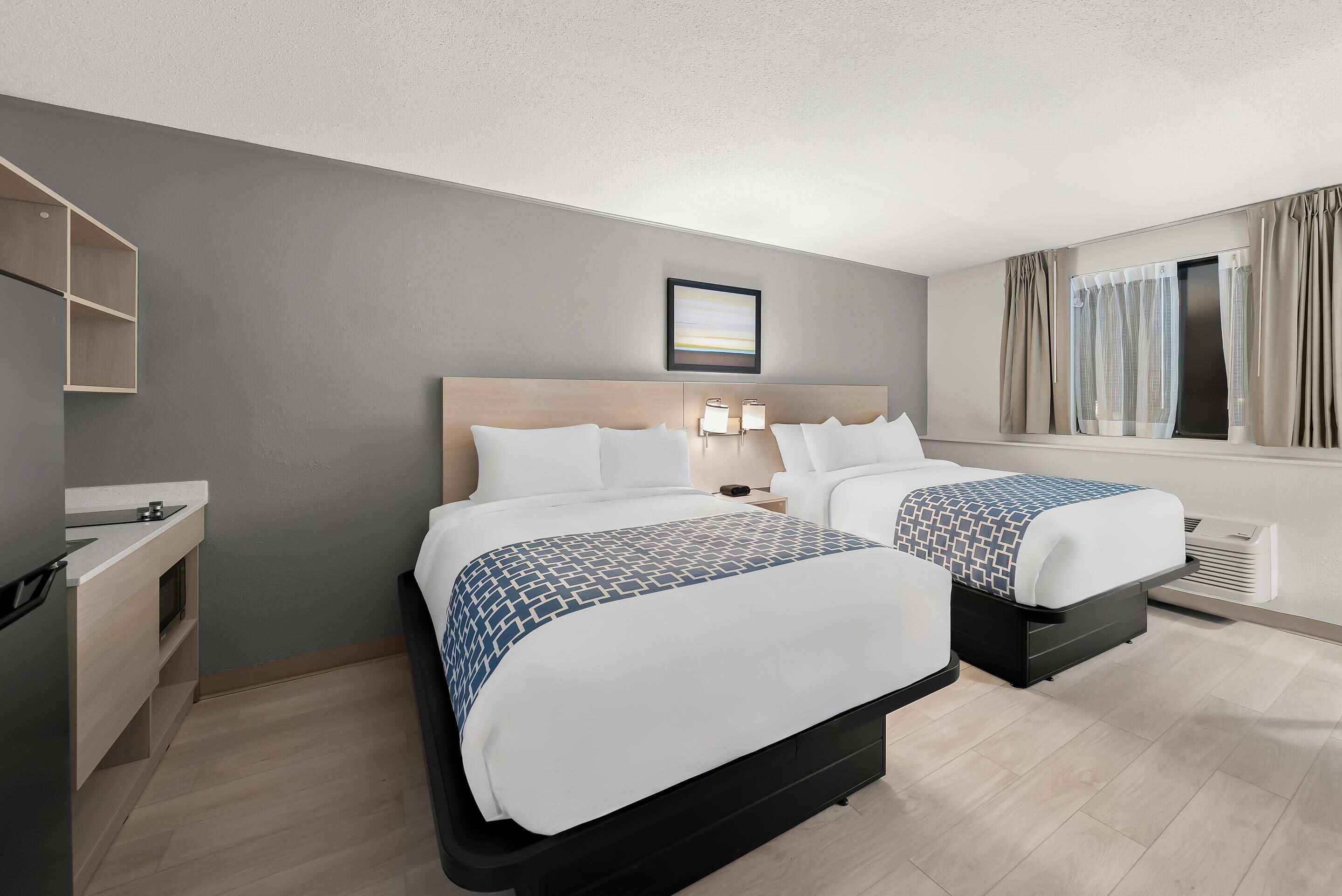 Suite, 2 Double Beds, Non Smoking | Laptop workspace, blackout drapes, free WiFi, bed sheets