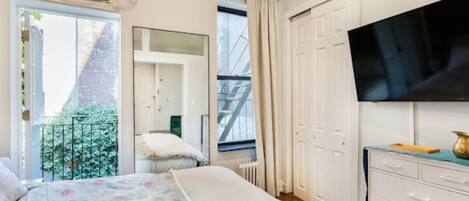 1 bedroom, desk, iron/ironing board, travel cot