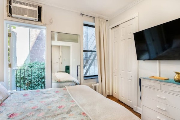 1 bedroom, desk, iron/ironing board, travel crib
