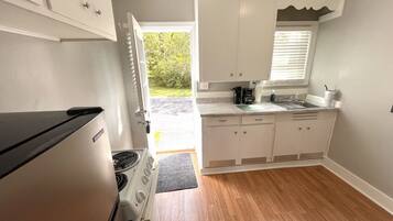 Oven, stovetop, coffee/tea maker, cookware/dishes/utensils