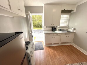 Oven, stovetop, coffee/tea maker, cookware/dishes/utensils