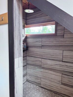 Shower, hair dryer, towels, soap