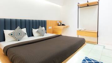 Deluxe Double Room | Blackout drapes, iron/ironing board, free WiFi, bed sheets