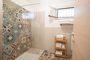 Hair dryer, bidet, towels, soap