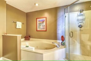 Shower, jetted tub, towels