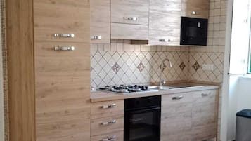 Comfort Quadruple Room, Balcony, Sea View | Private kitchen