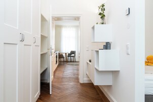 Economy Apartment, Balcony, Garden View | Living area | 161-cm flat-screen TV with cable channels