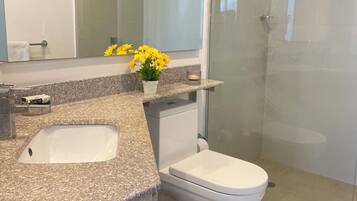 Shower, towels, soap, toilet paper