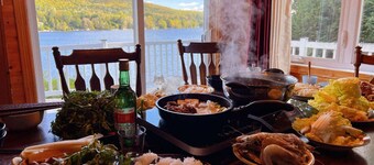 Waterfront charming 3-bedroom cottage at Lac Labelle with hot tub and WiFi