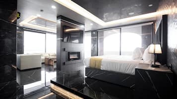 Suite estudio panorámica, vista a la ciudad | 1 habitación, minibar y caja de seguridad en la habitación