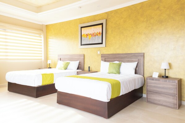 Habitació quàdruple estàndard | 1 dormitori, minibar i caixa forta a l'habitació 