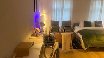 1 bedroom, desk, iron/ironing board, travel crib