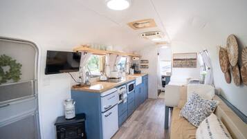 Microwave, stovetop, coffee/tea maker, toaster