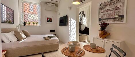 2 dormitorios, tabla de planchar con plancha, wifi y ropa de cama