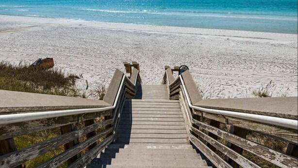 A wooden staircase leading to a beach with a clear view of the ocean. - 30A Driftwood/HotTub/Bikes/Close2Seaside (Santa Rosa Beach)