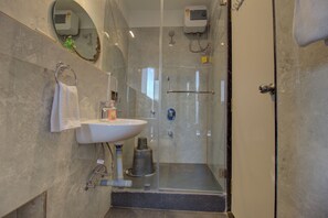 Deluxe Room, 1 Queen Bed, City View | Bathroom | Slippers - Greenstones Boutique Hotel (Nashik)