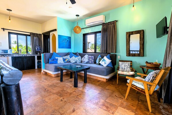 Suite Deluxe, balcon, vue sur l’océan | Aire de séjour