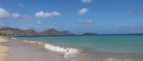 On the beach, sun-loungers, beach towels
