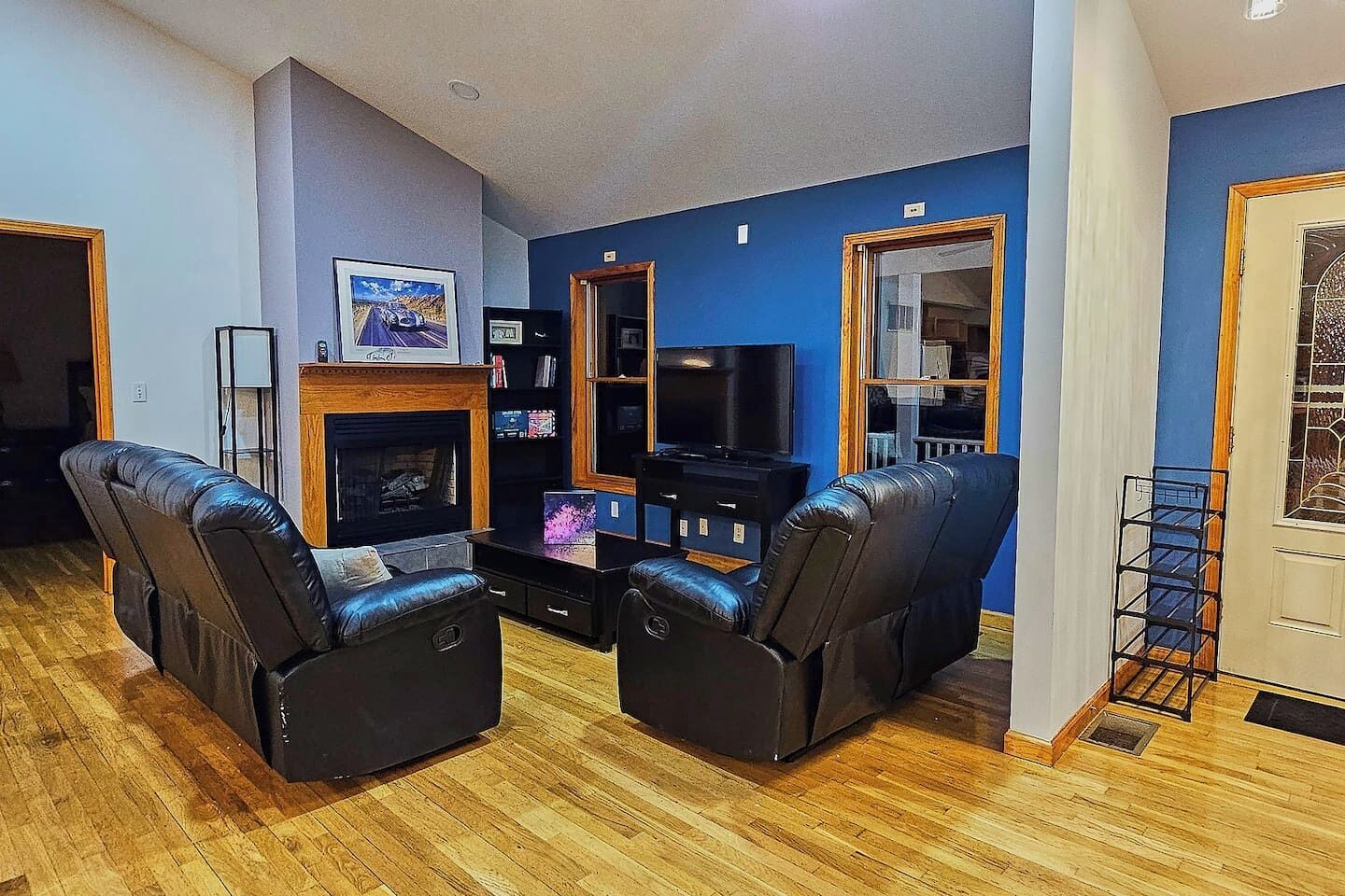 Smart TV, fireplace, books