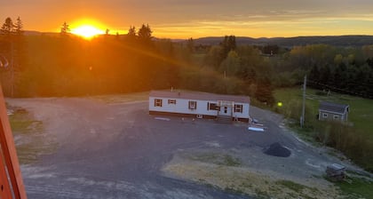 Cozy 2-bedroom mobile home in charming Madawaska with AC, WiFi