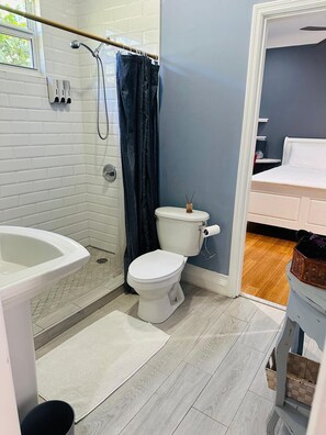 Shower, hair dryer, towels, soap