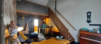 Vacation in a little school? Former classrooms with communal living kitchen!