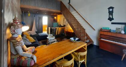 Vacation in a little school? Former classrooms with communal living kitchen!