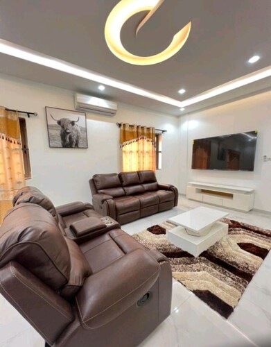 Cozy 2-bedroom apartment in beautiful Lome with AC, WiFi, security agent