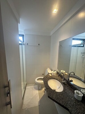 Shower, towels, soap, toilet paper