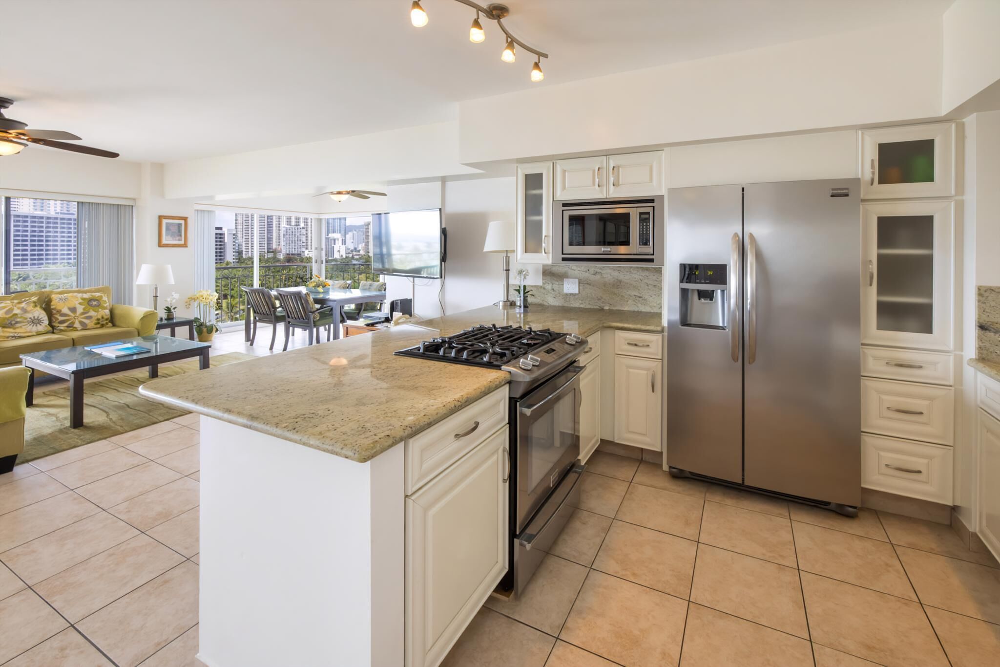 Fridge, stovetop, dishwasher, coffee/tea maker