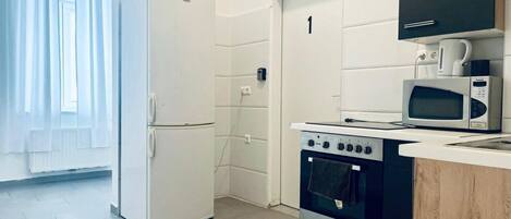 Microwave, stovetop, electric kettle, toaster