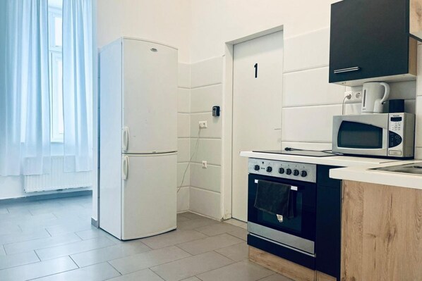 Microwave, stovetop, electric kettle, toaster