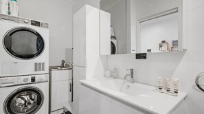 Shower, hair dryer, towels