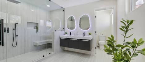 Shower, hair dryer, bidet, towels