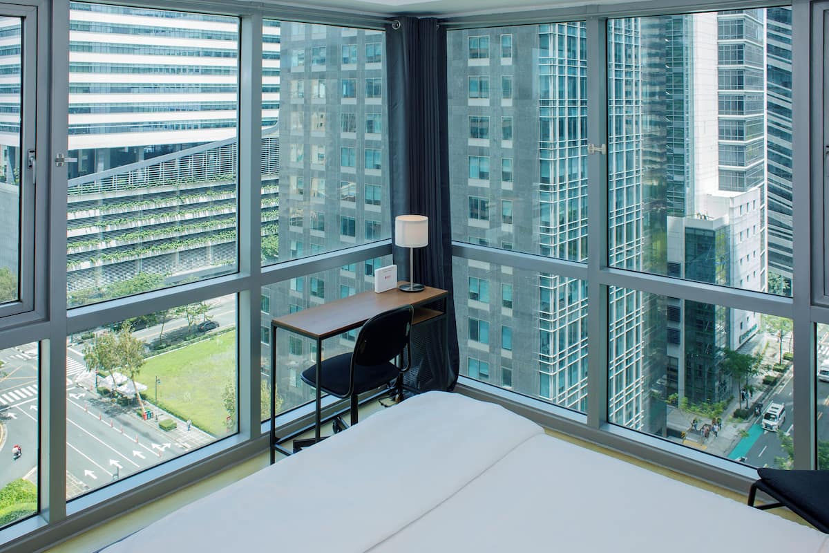 Apartamento luxo, vista para a cidade | 1 quarto, ferros/tábuas de passar roupa, Wi-Fi de cortesia