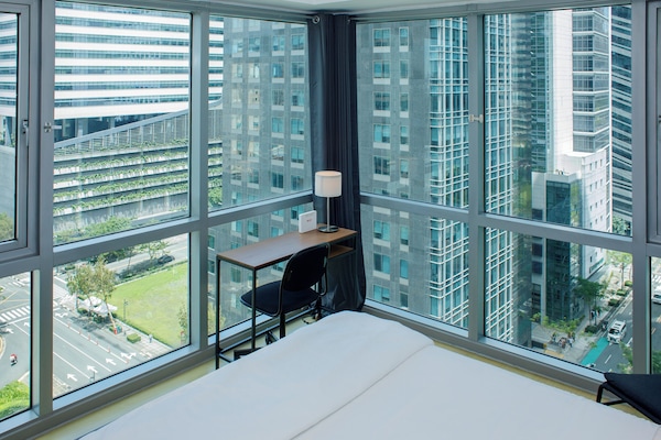 Departamento Deluxe, vista a la ciudad | 1 habitación, tabla de planchar con plancha, wifi gratis y ropa de cama