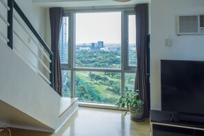 Luxury Loft | Living area | 40-inch Smart TV with digital channels