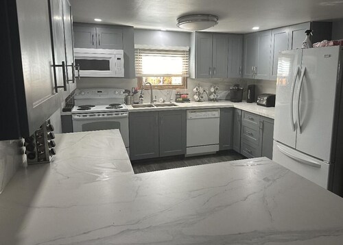 Enjoy our beautiful lake front cottage on little lake with our 4 bedroom cottage