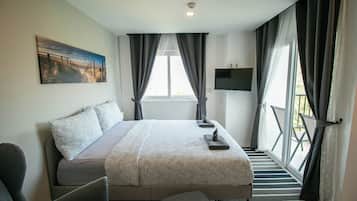 1 bedroom, desk, iron/ironing board, travel crib