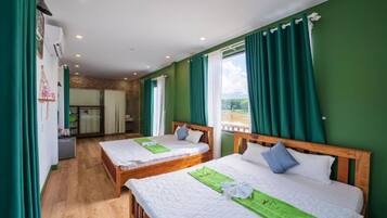 Quadruple Room | Minibar, desk, laptop workspace, blackout curtains