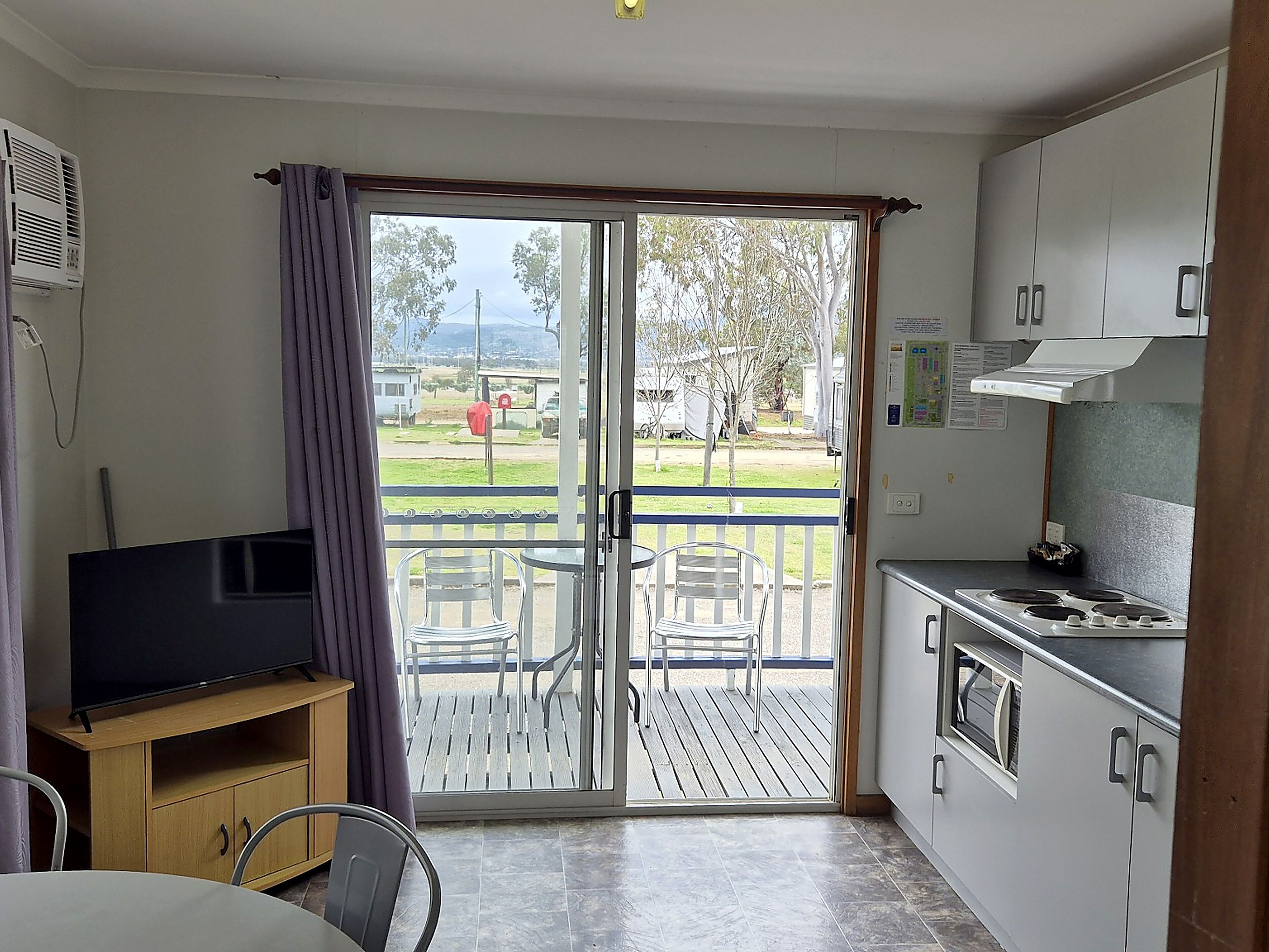 Standard 1 Bedroom Cabin - Not Pet Friendly | Private kitchen | Full-size fridge, microwave, stovetop, toaster