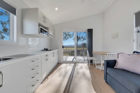 Deluxe Studio - Not Pet Friendly | Private kitchen. Tamworth Holiday Park